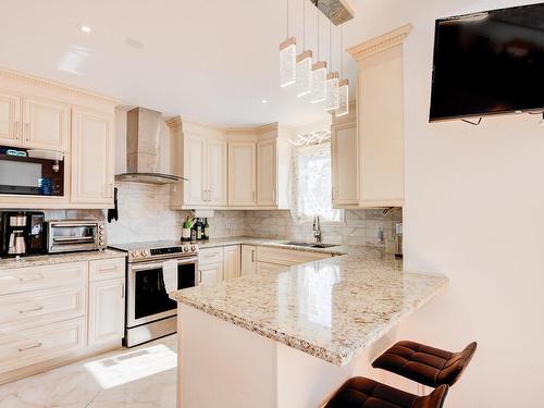 Cuisine - 428 Rue Ivanhoe, Laval (Fabreville), QC - Indoor Photo Showing Kitchen With Upgraded Kitchen