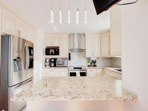 Cuisine - 428 Rue Ivanhoe, Laval (Fabreville), QC - Indoor Photo Showing Kitchen With Upgraded Kitchen