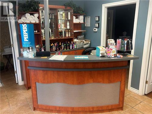 Reception Area with Cash Register - 208 Morrison Road, Pembroke, ON 