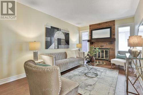 40 Longbow Square, Toronto, ON - Indoor Photo Showing Living Room With Fireplace