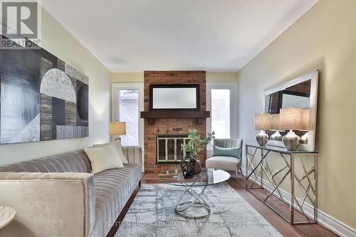 40 Longbow Square, Toronto, ON - Indoor Photo Showing Living Room With Fireplace