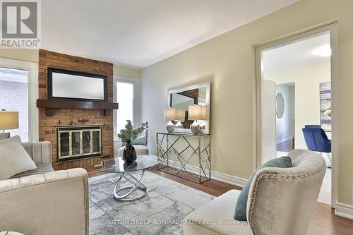 40 Longbow Square, Toronto, ON - Indoor Photo Showing Living Room With Fireplace