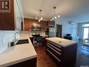 410 2101 Heseltine Road, Regina, SK  - Indoor Photo Showing Kitchen With Double Sink With Upgraded Kitchen 