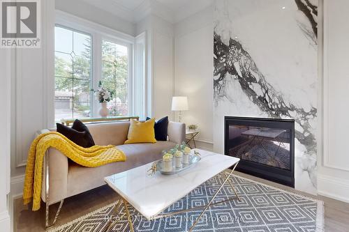 12 Resolution Crescent, Toronto, ON - Indoor Photo Showing Living Room With Fireplace