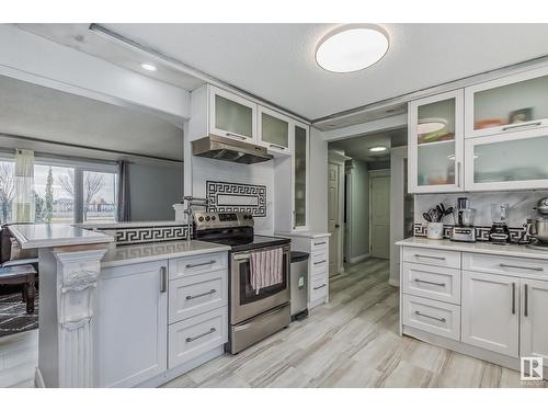 9304/08 127 Av Nw, Edmonton, AB - Indoor Photo Showing Kitchen With Upgraded Kitchen