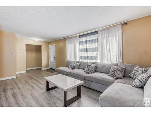 9304/08 127 Av Nw, Edmonton, AB - Indoor Photo Showing Living Room