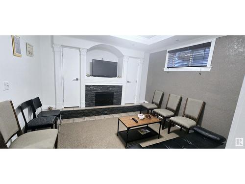 5412 162B Ave Nw Nw, Edmonton, AB - Indoor Photo Showing Living Room With Fireplace