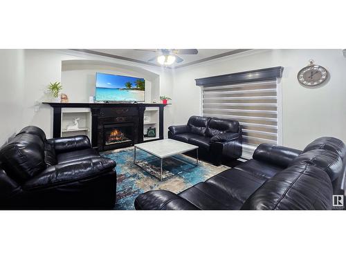 5412 162B Ave Nw Nw, Edmonton, AB - Indoor Photo Showing Living Room With Fireplace