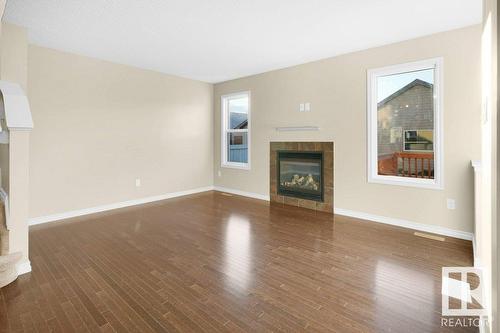 582 Tamarack Rd Nw Nw, Edmonton, AB - Indoor With Fireplace