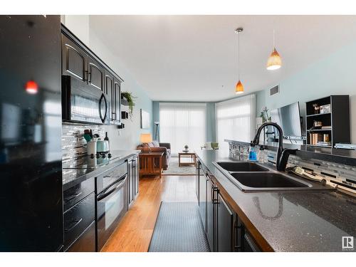 #445 4827 104A St Nw, Edmonton, AB - Indoor Photo Showing Kitchen With Double Sink With Upgraded Kitchen