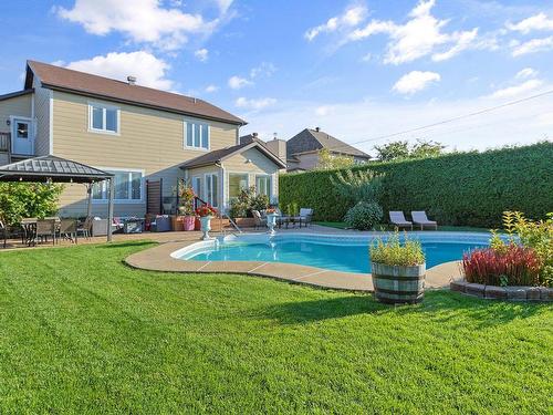 Backyard - 39 Rue Monseigneur-Dorais, Mercier, QC - Outdoor With In Ground Pool With Backyard