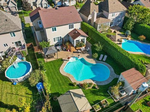 Aerial photo - 39 Rue Monseigneur-Dorais, Mercier, QC - Outdoor With Above Ground Pool With Backyard