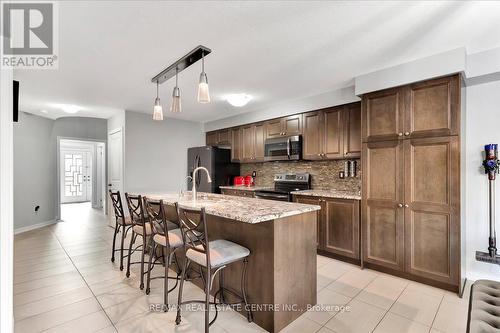 30 Scarletwood Street, Hamilton, ON - Indoor Photo Showing Kitchen With Upgraded Kitchen