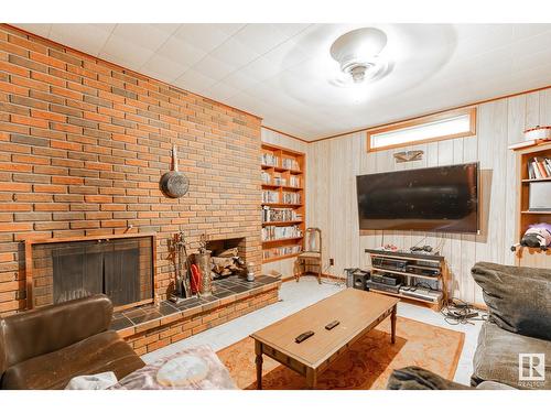 4801 Ada Bv Nw, Edmonton, AB - Indoor Photo Showing Living Room With Fireplace