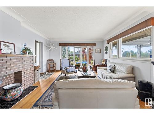 4801 Ada Bv Nw, Edmonton, AB - Indoor Photo Showing Living Room With Fireplace