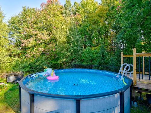 Pool - 55  - 57 Rue Du Domaine, Lavaltrie, QC - Outdoor With Above Ground Pool With Backyard