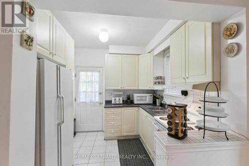 405 Northcliffe Boulevard, Toronto, ON - Indoor Photo Showing Kitchen With Double Sink