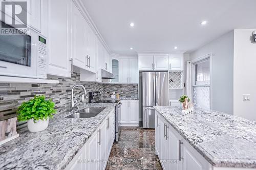 8 Whistling Hills Drive, Toronto, ON - Indoor Photo Showing Kitchen With Double Sink With Upgraded Kitchen