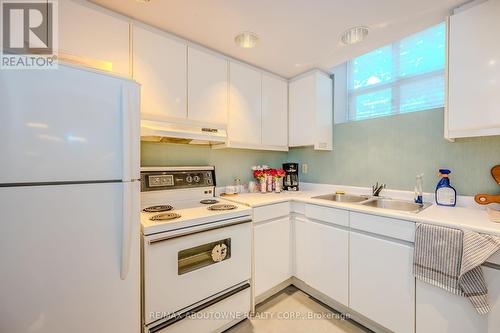 310 - 2199 Sixth Line, Oakville, ON - Indoor Photo Showing Kitchen With Double Sink