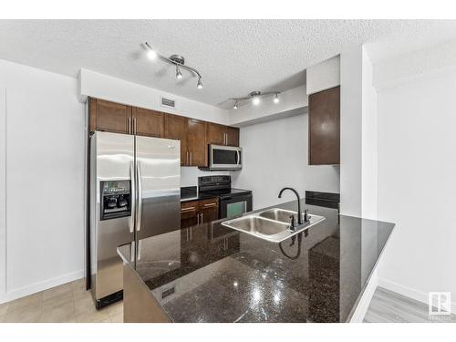 #303 11816 22 Av Sw, Edmonton, AB - Indoor Photo Showing Kitchen With Double Sink