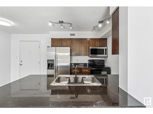 #303 11816 22 Av Sw, Edmonton, AB - Indoor Photo Showing Kitchen With Double Sink