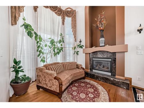 15907 91 St Nw, Edmonton, AB - Indoor Photo Showing Living Room With Fireplace