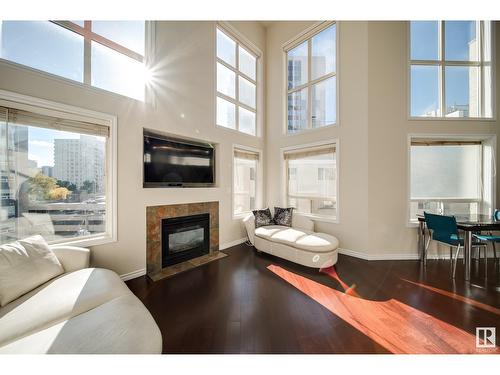 #504 10033 116 St Nw, Edmonton, AB - Indoor Photo Showing Living Room With Fireplace