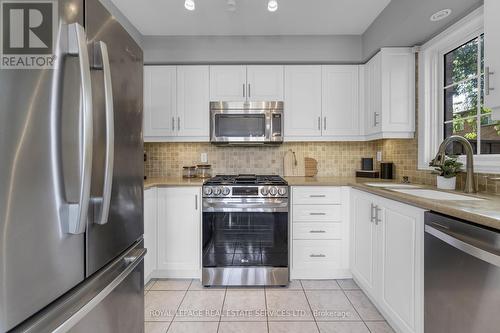 20 - 5555 Prince William Drive, Burlington, ON - Indoor Photo Showing Kitchen With Stainless Steel Kitchen With Upgraded Kitchen