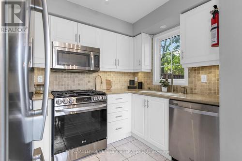 20 - 5555 Prince William Drive, Burlington, ON - Indoor Photo Showing Kitchen With Stainless Steel Kitchen With Upgraded Kitchen