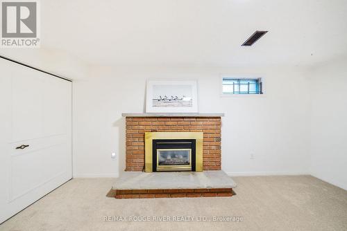 572 Sandhurst Circle, Toronto, ON - Indoor Photo Showing Living Room With Fireplace