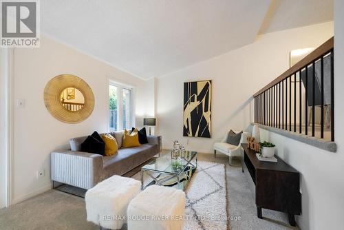 572 Sandhurst Circle, Toronto, ON - Indoor Photo Showing Living Room