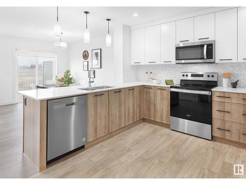 3408 169 St Sw, Edmonton, AB - Indoor Photo Showing Kitchen With Double Sink With Upgraded Kitchen