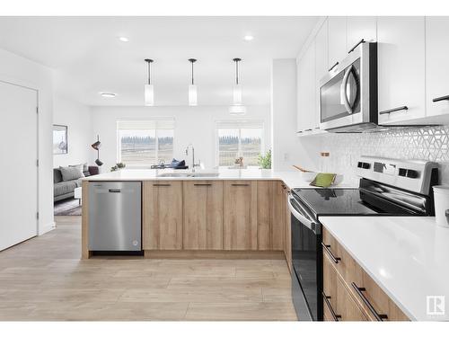 3408 169 St Sw, Edmonton, AB - Indoor Photo Showing Kitchen With Upgraded Kitchen