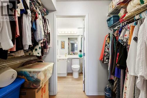 Primary walk through closet - 2210, 11 Chaparral Ridge Drive Se, Calgary, AB 