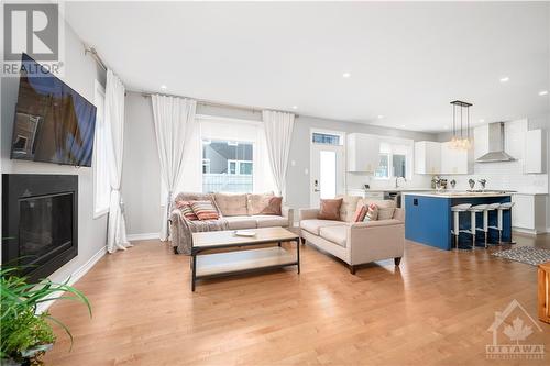 34 Coppermine Street, Ottawa, ON - Indoor Photo Showing Living Room With Fireplace