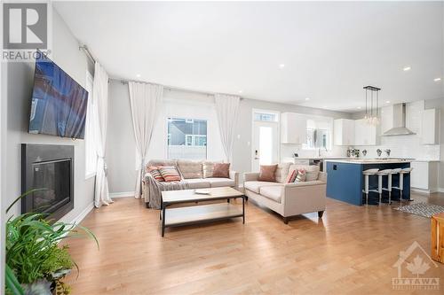 34 Coppermine Street, Ottawa, ON - Indoor Photo Showing Living Room With Fireplace