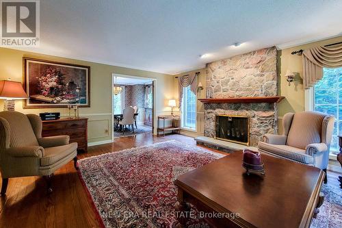 4100 Ennisclare Drive, Milton, ON - Indoor Photo Showing Living Room With Fireplace