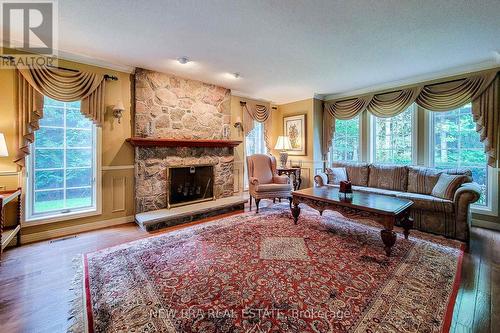 4100 Ennisclare Drive, Milton, ON - Indoor Photo Showing Living Room With Fireplace