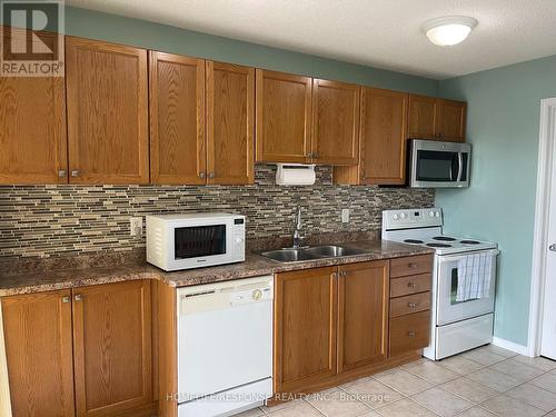 23 - 950 Highland Road W, Kitchener, ON - Indoor Photo Showing Kitchen With Double Sink