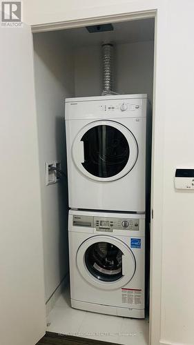 4507 - 11 Wellesley Street W, Toronto, ON - Indoor Photo Showing Laundry Room