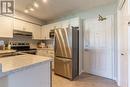 213 - 1480 Bishops Gate, Oakville, ON  - Indoor Photo Showing Kitchen With Stainless Steel Kitchen With Double Sink 