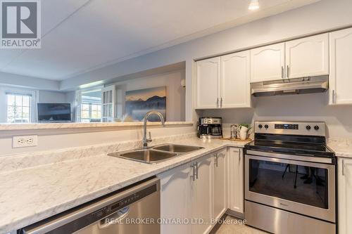 213 - 1480 Bishops Gate, Oakville, ON - Indoor Photo Showing Kitchen With Stainless Steel Kitchen With Double Sink