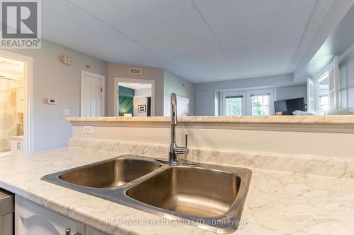 213 - 1480 Bishops Gate, Oakville, ON - Indoor Photo Showing Kitchen With Double Sink