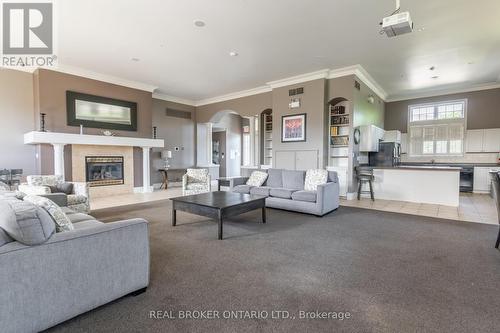 213 - 1480 Bishops Gate, Oakville, ON - Indoor Photo Showing Living Room With Fireplace