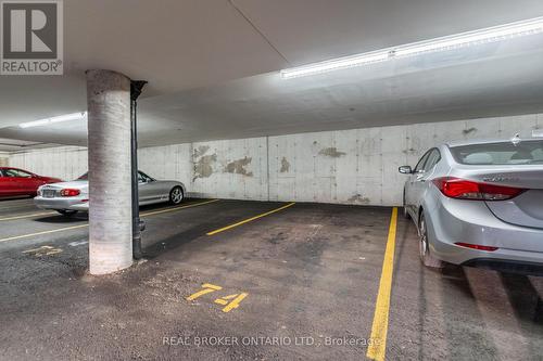 213 - 1480 Bishops Gate, Oakville, ON - Indoor Photo Showing Garage