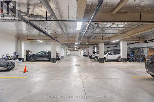 406 - 310 Broadway Avenue, Orangeville, ON - Indoor Photo Showing Garage