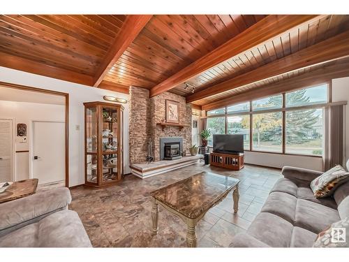 8704 90 Av Nw, Edmonton, AB - Indoor Photo Showing Living Room With Fireplace