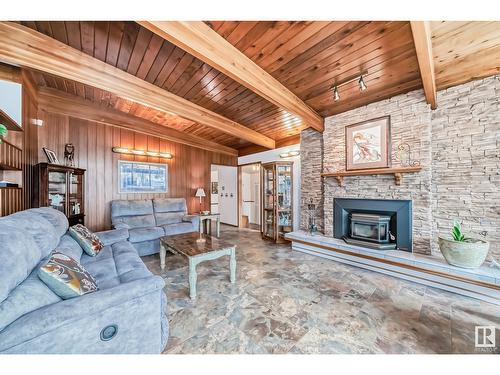 8704 90 Av Nw, Edmonton, AB - Indoor Photo Showing Living Room With Fireplace