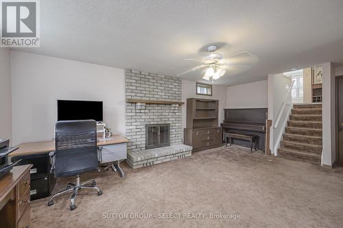 19 Banting Crescent, London, ON - Indoor Photo Showing Office With Fireplace