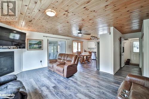 410 Etwell Road, Huntsville (Stisted), ON - Indoor Photo Showing Living Room With Fireplace